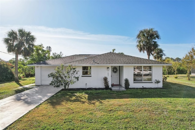 ranch-style home with a garage and a front lawn