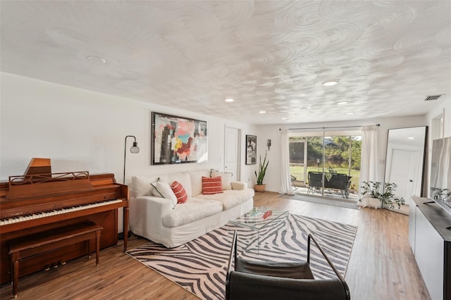 living room featuring light hardwood / wood-style floors