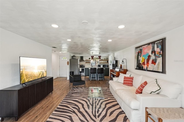 living room with light hardwood / wood-style floors