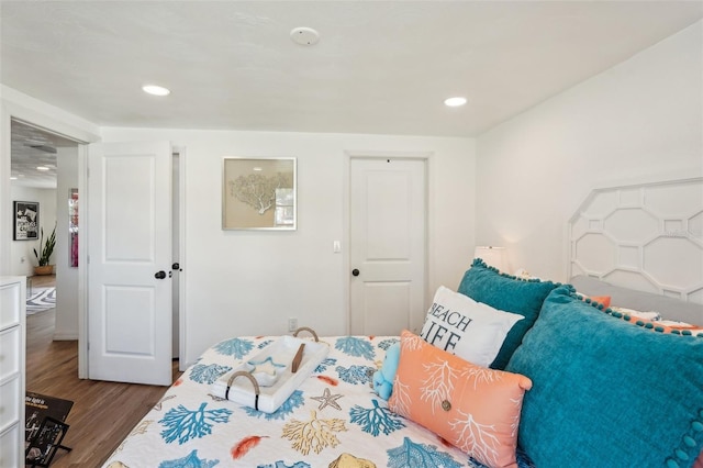 bedroom featuring wood-type flooring