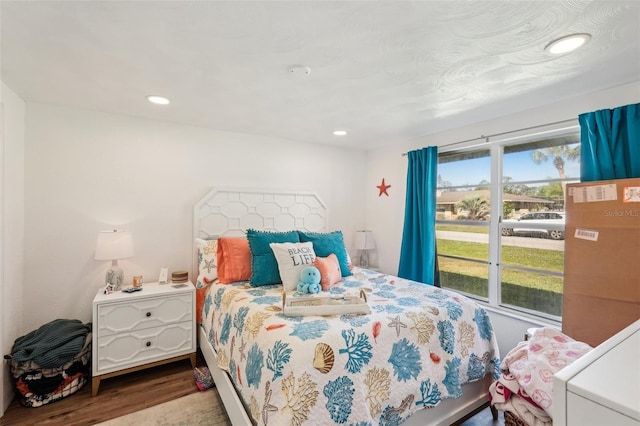 bedroom featuring hardwood / wood-style flooring