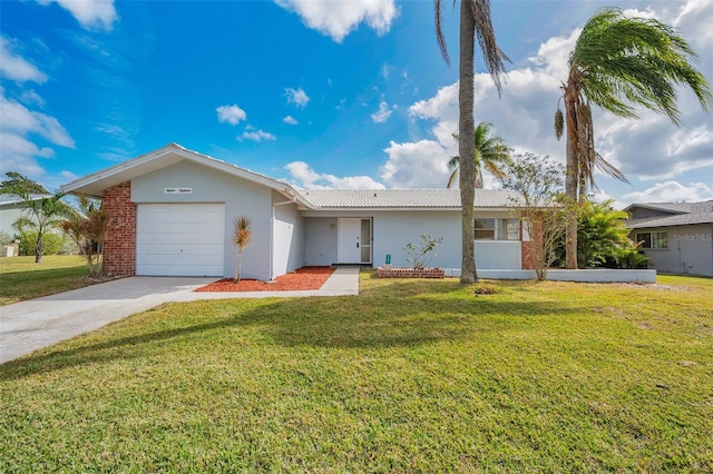 ranch-style home with a front lawn and a garage