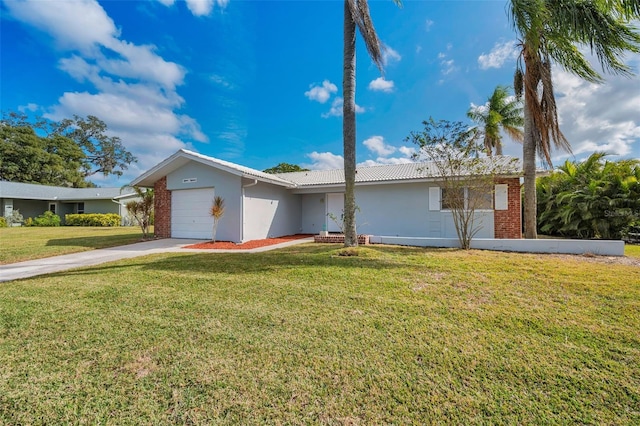 single story home featuring a front lawn and a garage