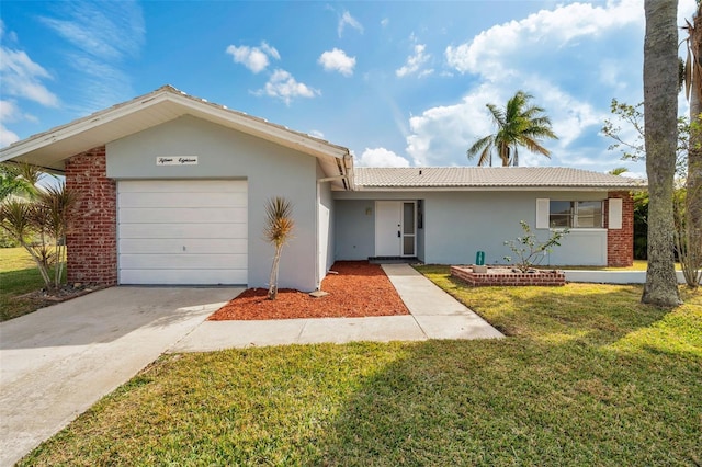 ranch-style house with a garage and a front lawn