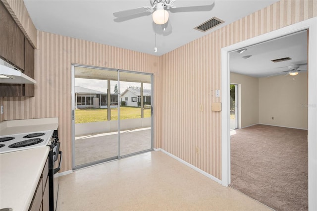 kitchen with electric range and ceiling fan