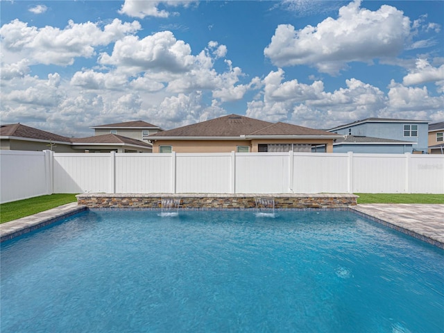 view of pool with pool water feature