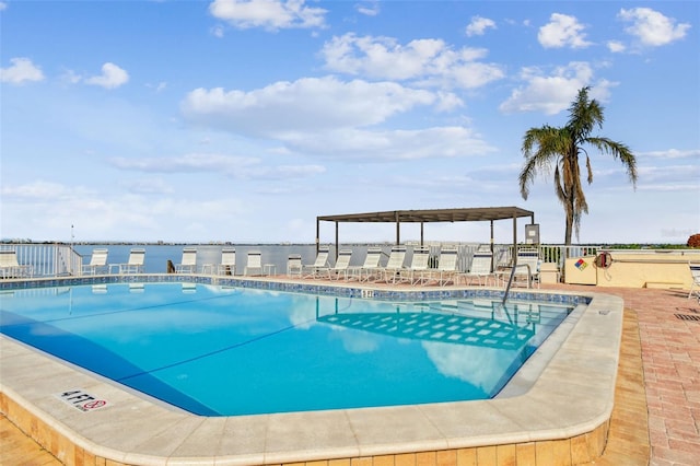 view of swimming pool with a patio