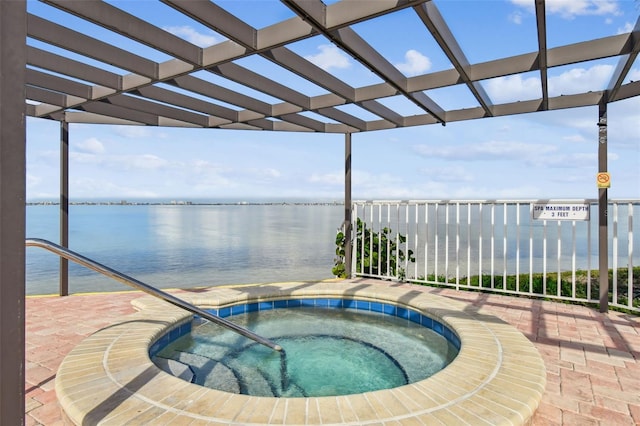 view of swimming pool featuring a water view, a hot tub, and a pergola