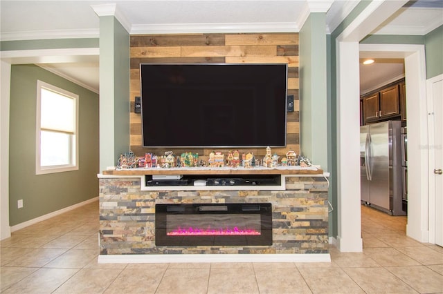 details featuring stainless steel fridge, a fireplace, and ornamental molding