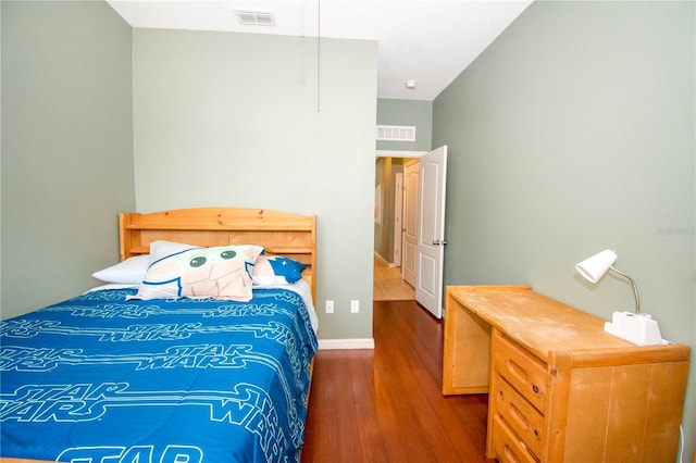 bedroom featuring hardwood / wood-style floors