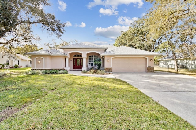 view of front facade featuring a front lawn, a porch, and a garage