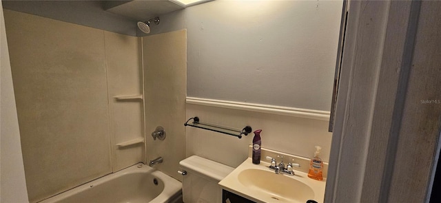 full bathroom with vanity, washtub / shower combination, and toilet