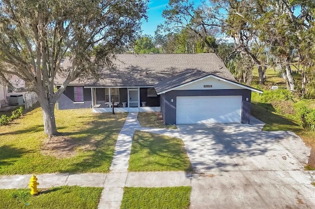 single story home with a garage and a front yard