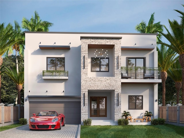 contemporary house featuring a balcony and a garage