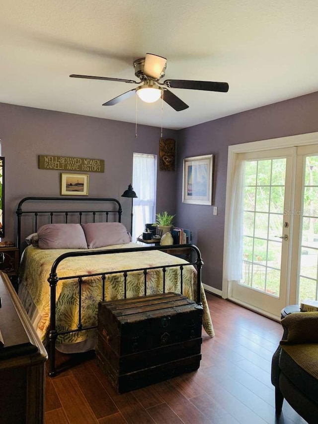 bedroom featuring hardwood / wood-style flooring, ceiling fan, and access to exterior