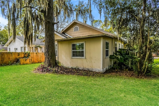 view of property exterior featuring a yard