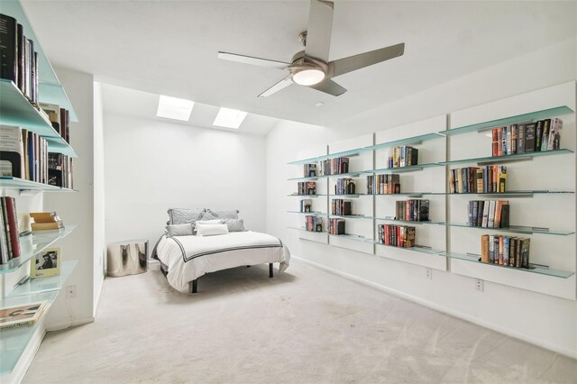 bedroom featuring ceiling fan and light colored carpet