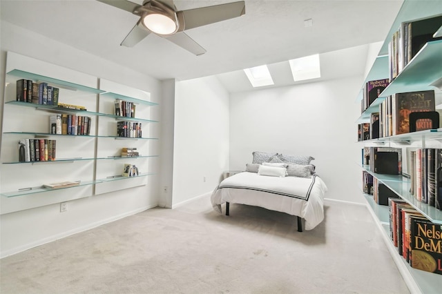 bedroom featuring light carpet and ceiling fan