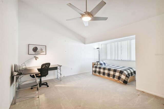 bedroom with ceiling fan, carpet, and vaulted ceiling