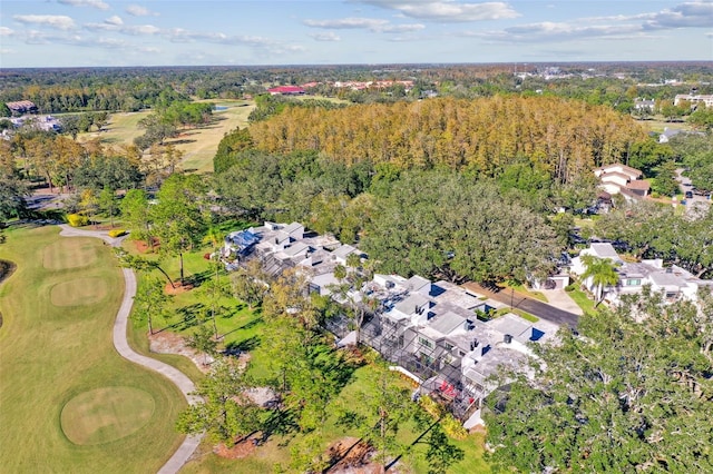 bird's eye view featuring a forest view and a residential view