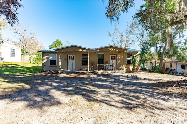 view of front of property featuring a patio