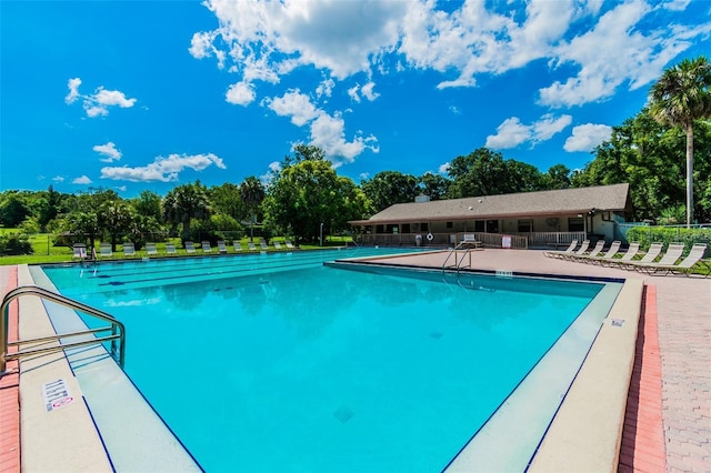 view of swimming pool featuring a patio