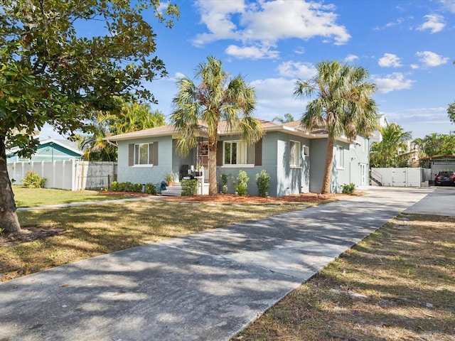 ranch-style house with a front yard