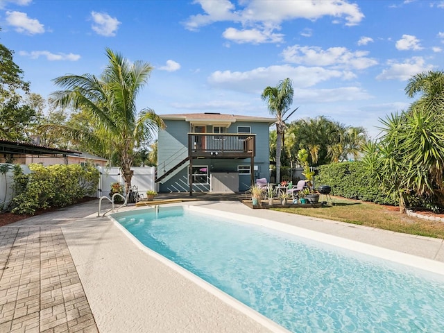 view of swimming pool with a patio