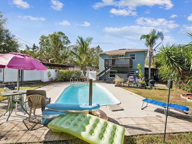 view of pool featuring a patio