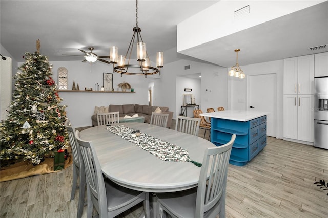 dining room featuring ceiling fan and light wood-type flooring