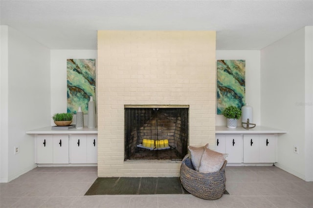 tiled living room with a fireplace