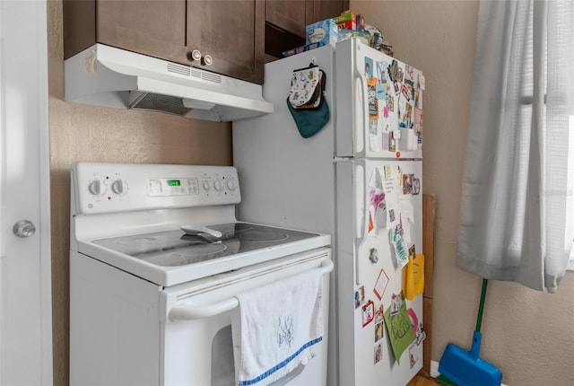 kitchen featuring white appliances