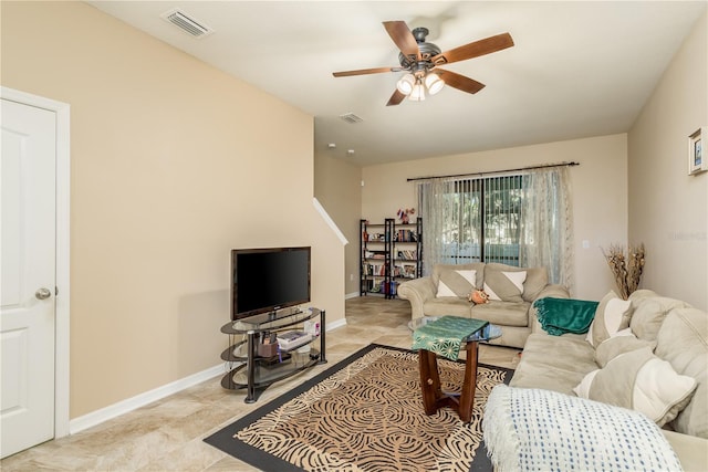 living room featuring ceiling fan