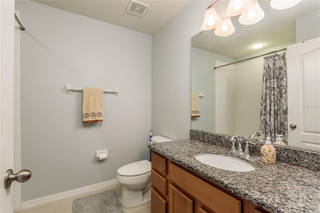 bathroom with toilet, vanity, tile patterned floors, and curtained shower