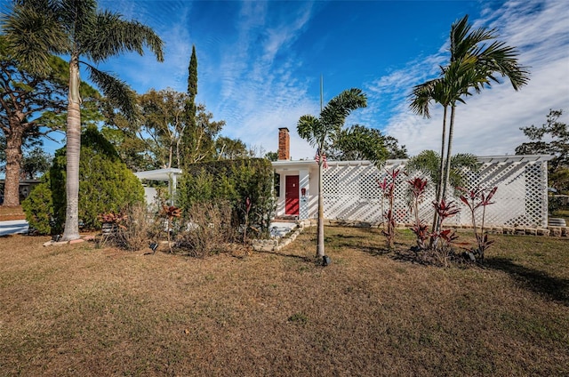 exterior space featuring a front lawn