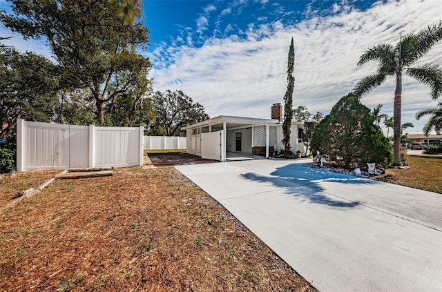 view of yard featuring a carport