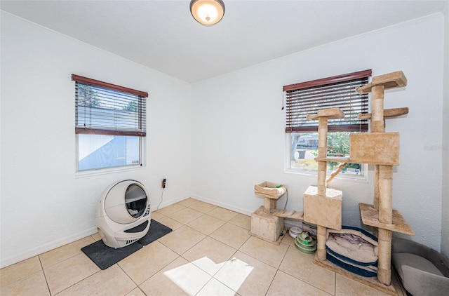 laundry room with light tile patterned floors