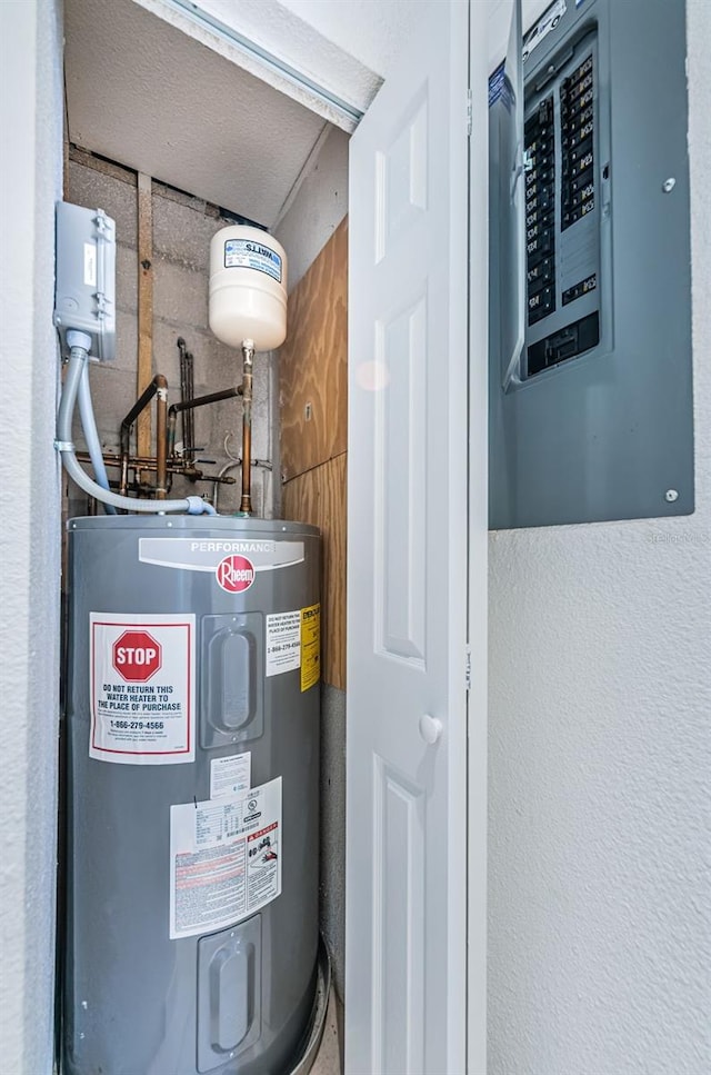 utility room with water heater