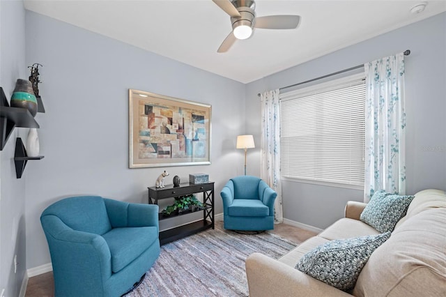 living room featuring ceiling fan