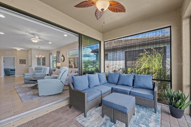 view of patio / terrace featuring ceiling fan and outdoor lounge area