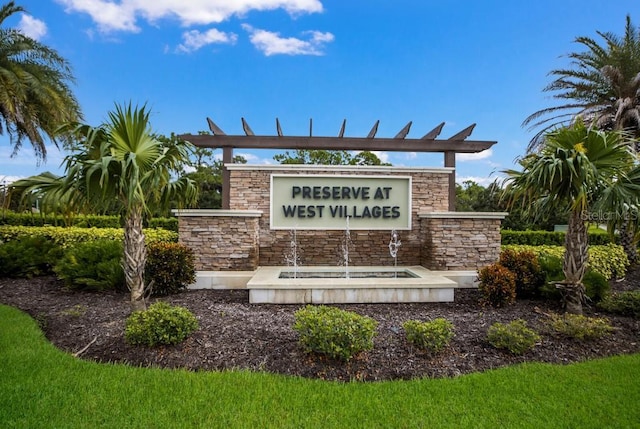 view of community sign