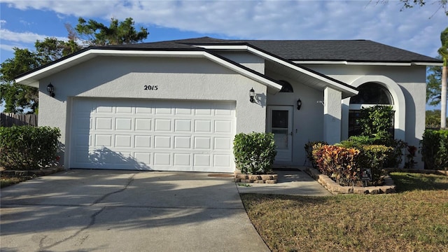 ranch-style home with a garage