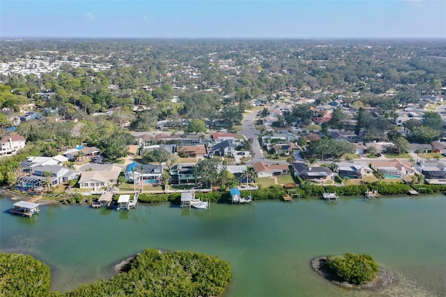 bird's eye view with a water view and a residential view