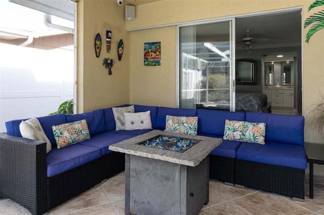 view of patio / terrace featuring an outdoor living space with a fire pit