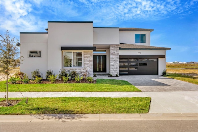 view of front of house featuring french doors and a garage