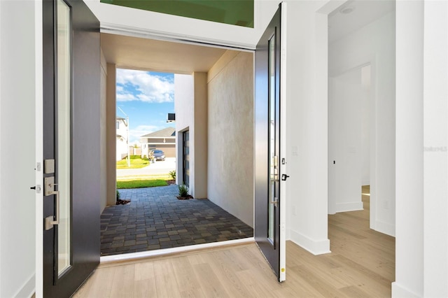 foyer featuring light wood-type flooring