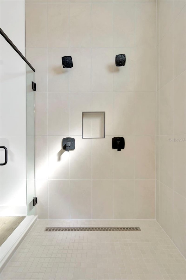 bathroom with an enclosed shower