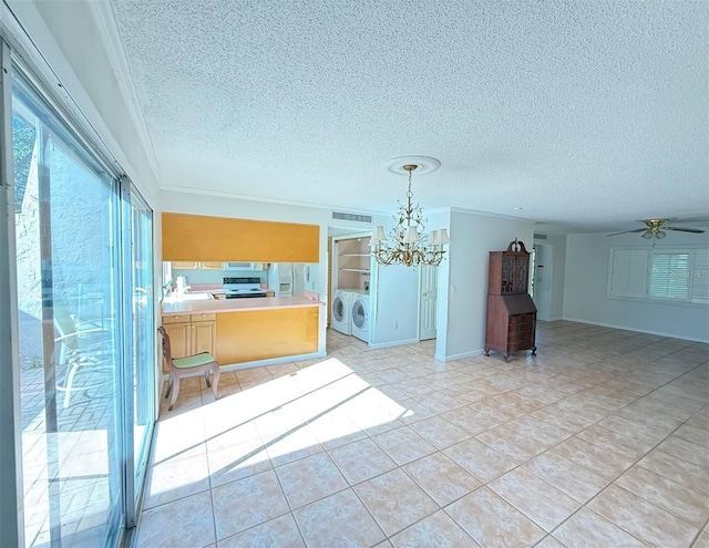 unfurnished living room with washing machine and clothes dryer, crown molding, a textured ceiling, light tile patterned flooring, and ceiling fan with notable chandelier