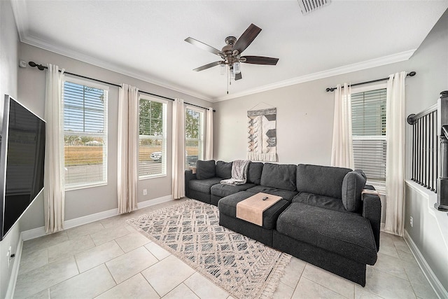 living room featuring ceiling fan, ornamental molding, and light tile patterned floors