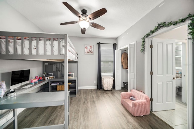 bedroom featuring ceiling fan and hardwood / wood-style floors